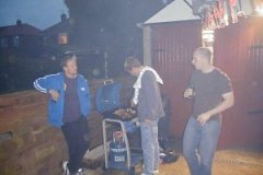 The men round the fire